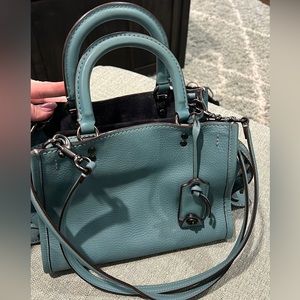 Coach Rogue 25 Marine Blue.